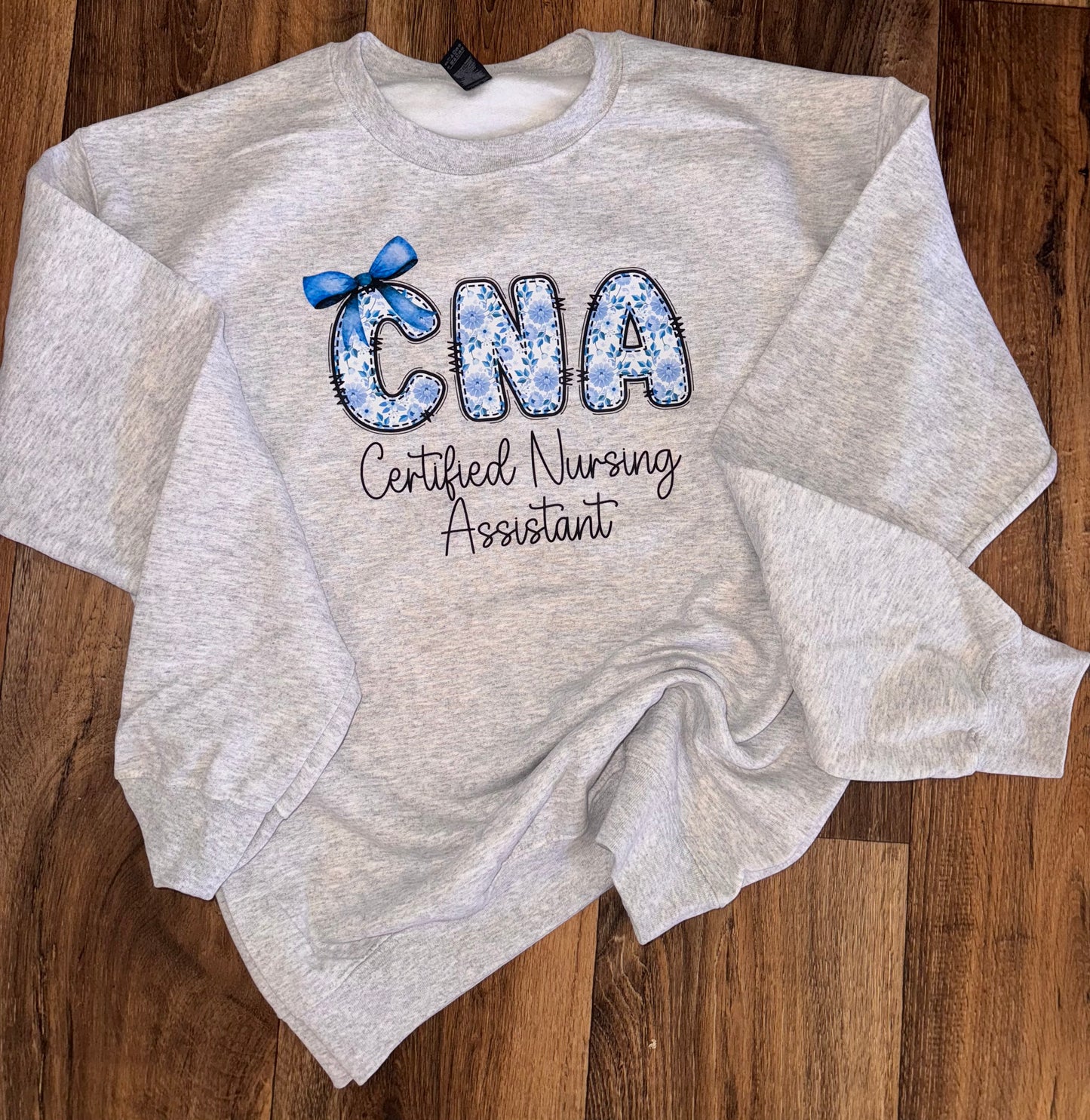 CNA blue floral shirt