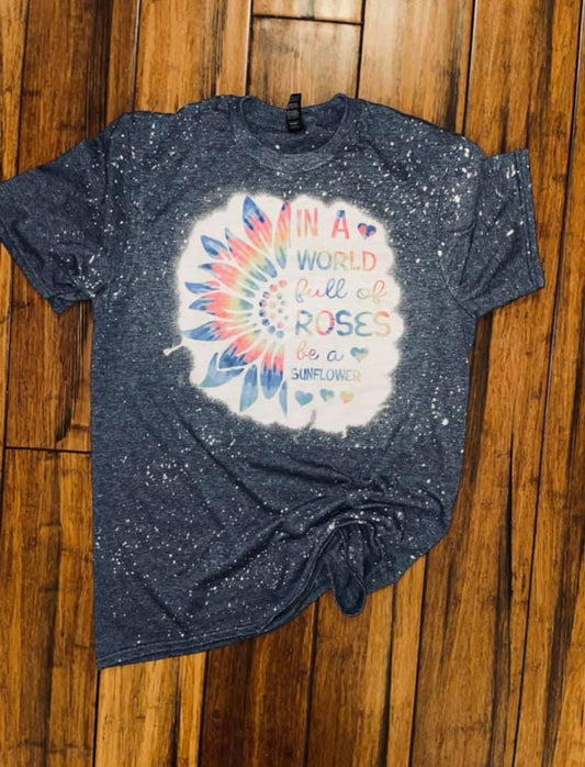 In a world full of roses be a sunflower bleached tee